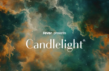 Promotional poster with fever presents Candlelight centered over a colorful cosmic nebula background with teal and orange clouds.