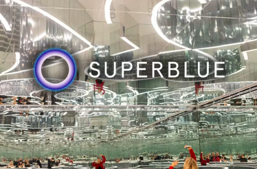 A promotional poster for Superblue's immersive art event