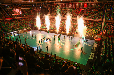 Spectacular moment at a Füchse Berlin handball match inside the Max-Schmeling-Halle.