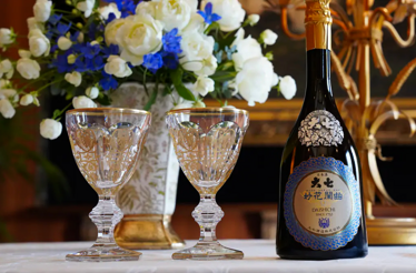 Daishichi sake bottle and tasting glasses for an exclusive sake pairing experience at Odo Lounge.