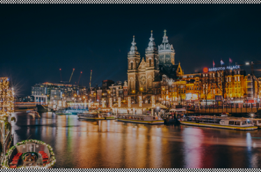 Scenic city landscape of Amsterdam at night.