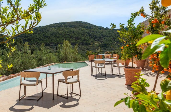 Tranquil outdoor dining terrace at the luxurious Villa Nai 3.3.