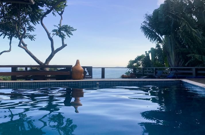 Poolside view overlooking the ocean at the capoeira retreat in Rio.