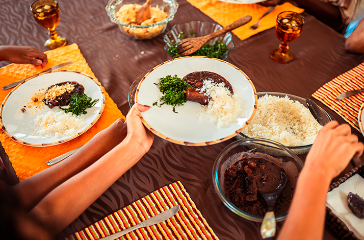 Traditional feijoada lunch served as part of the cultural experience.