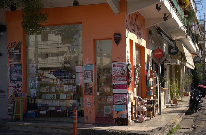 Bookstore with graffiti on its exterior walls, located in a neighborhood in Athens, Greece.