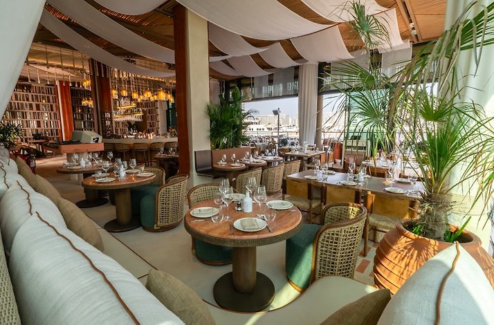 Interior of Son of a Fish, a seaside Greek restaurant located at Dubai Harbour.