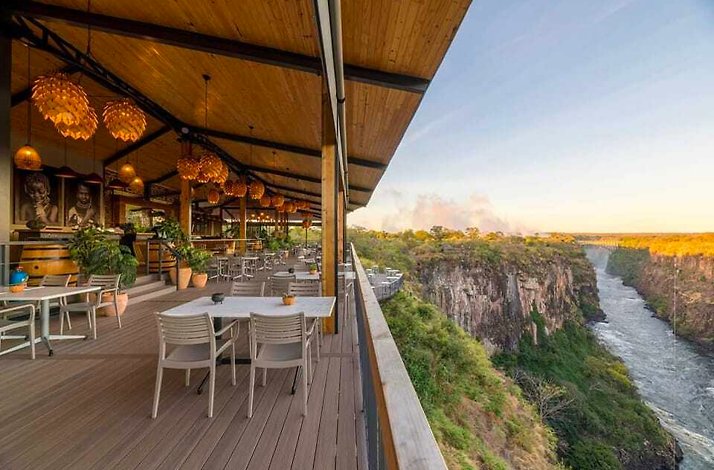 Scenic view from the restaurant's rooftop, showcasing the river and surrounding landscape.