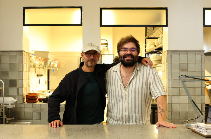 Nicocina and Chef Alejandro Gutíerrez, stand together at the counter of an open kitchen, ready to welcome guests into a warm and contemporary setting