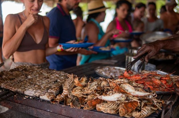 Tourists on the seafood barbeque  in Zanzibar