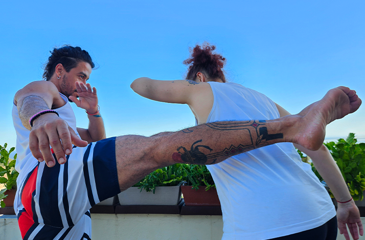 Dynamic capoeira movements performed outdoors in Rio de Janeiro, capturing the energy and flow of this Afro-Brazilian martial art.