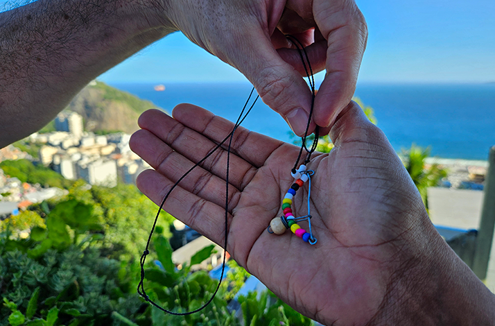 A handmade bracelet presented as a keepsake, symbolizing the personal and authentic nature of this Priceless capoeira experience in Rio.