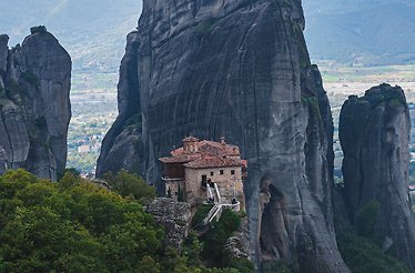 A scenic view of the Monastery of Rousanou in Meteora, Greece.