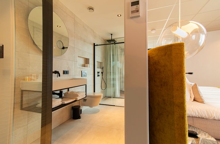 Cozy bathroom interior at Grand Hotel Beatrix.