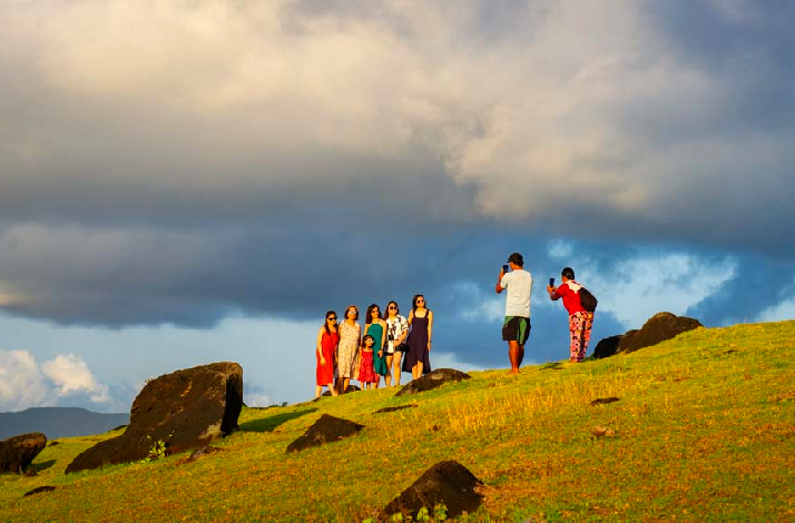 A family group taking a picture on a hill of Catanduanes. 