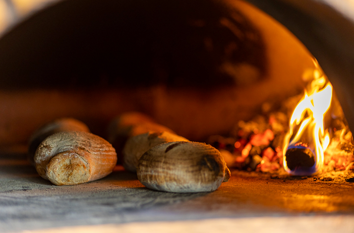 Artisan bread baking in a wood-fired oven