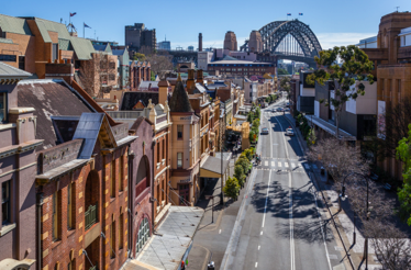 Sydney Harbour Bridge and historic city street.