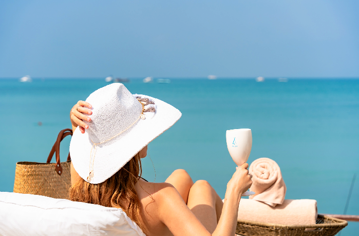 A lady relaxing at the Nikki Beach Koh Samui.