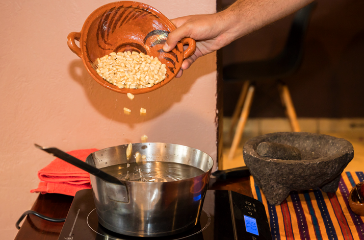 Corn being cooked as part of the ancestral nixtamalization process.