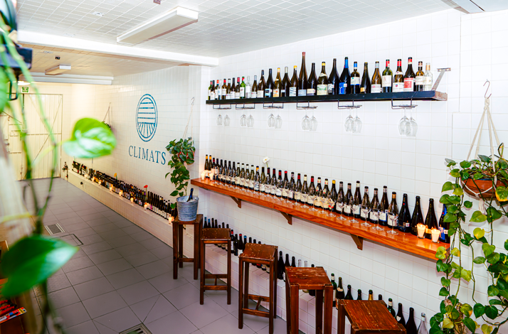 Shelves lined with small-production wines at La Table de Climats