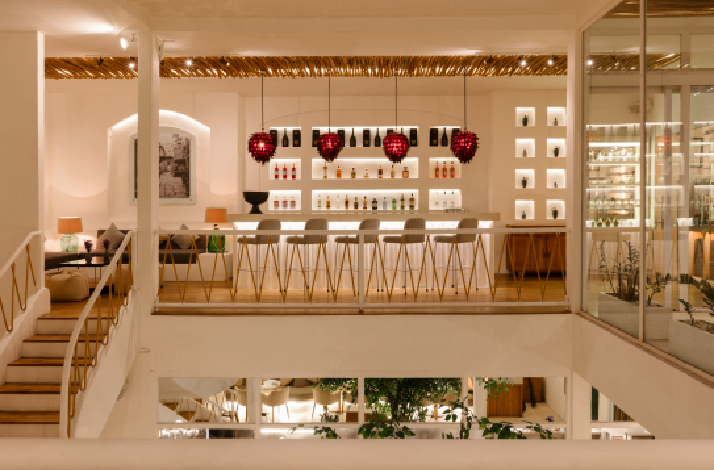 Mauri's upper-level bar with red pendants and wine display