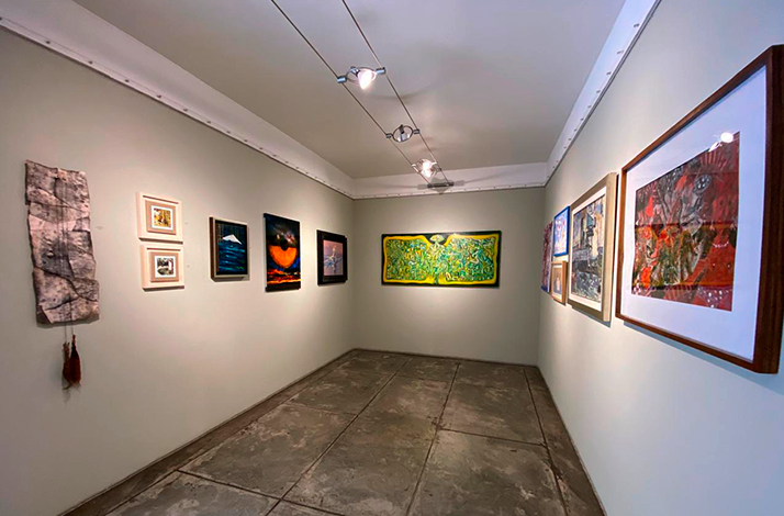 Paintings on display at Galería Oscar Román.