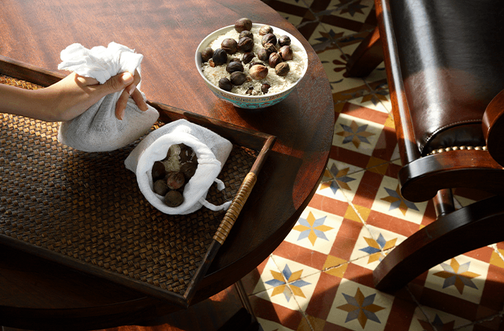 Ingredients and tools for the Nutmeg-Rice Rolling Massage, a warming treatment at Spa Village Malacca.