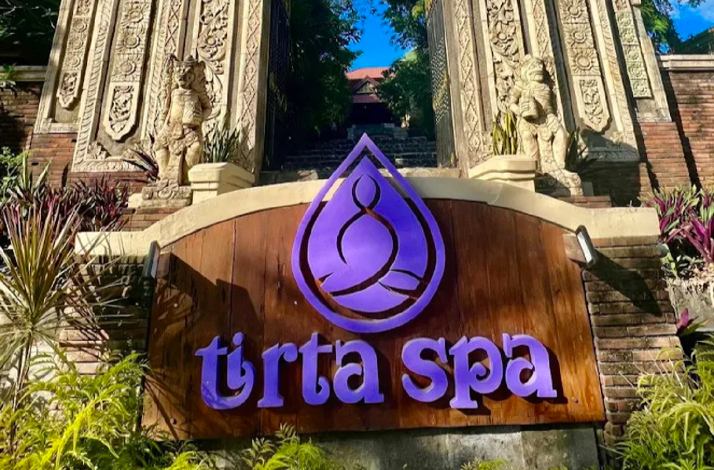 A purple sign for Tirta Spa in Boracay, Philippines.