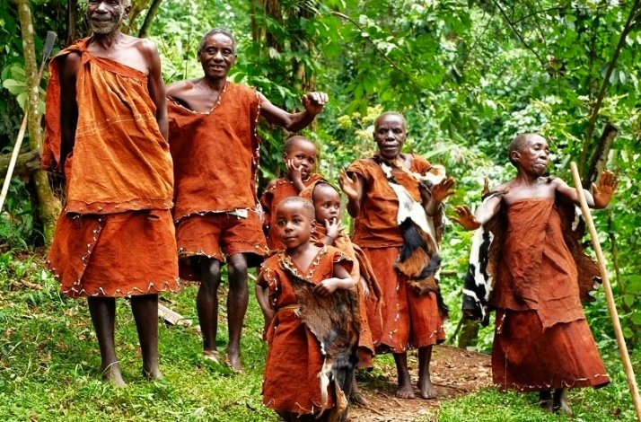 Batwa people in traditional clothing in Mgahinga Gorilla National Park, Uganda.