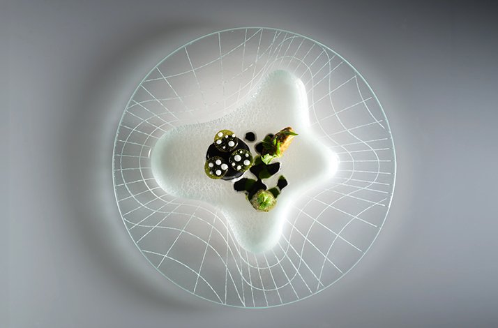 Fine dining dish served at three-Michelin-starred restaurant Enrico Bartolini al Mudec.
