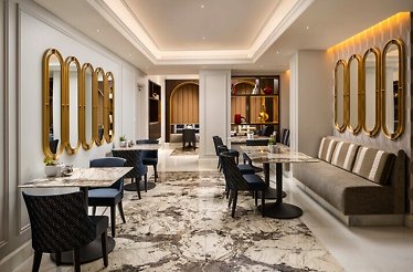 Dining area at Café Athénée in Bucharest, Romania.