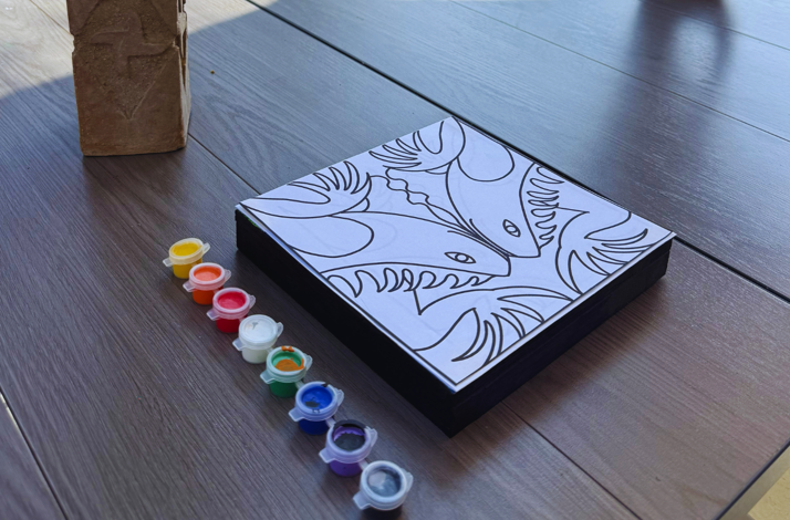 Blank Zapotec spirit animal sketch with paint set ready for a private interactive workshop.