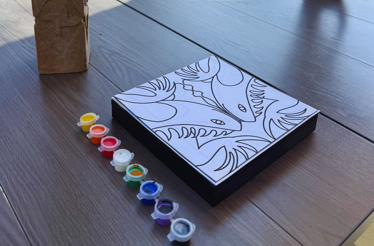 Blank Zapotec spirit animal sketch with paint set ready for a private interactive workshop.