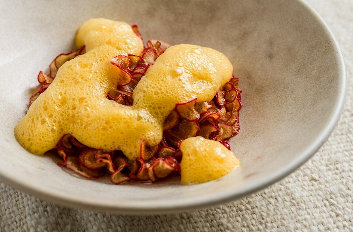 Afluente - Andean dish of crisped red radish under a warm golden foam