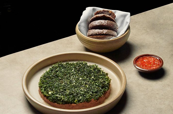 Oda - Cola de res — herb-crusted oxtail course with sourdough and Creole ají