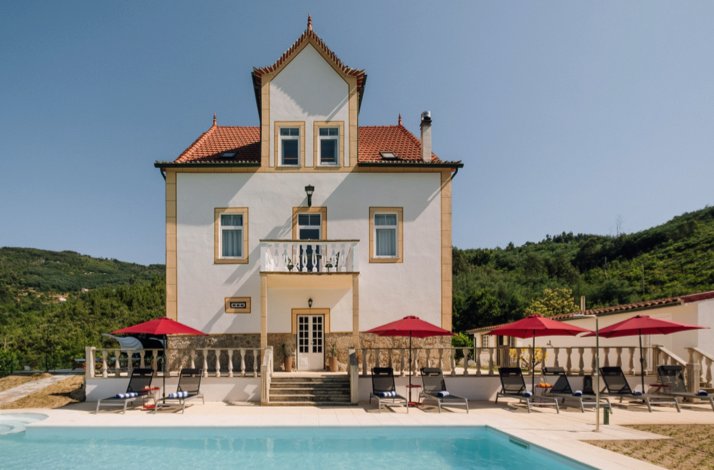 Palacete do Guerreiro boutique hotel and pool in São Gião, Portugal.