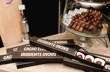 Artisanal Colombian chocolate displayed during a curated tasting experience that showcases the transformation of fine cacao from bean to finished product.