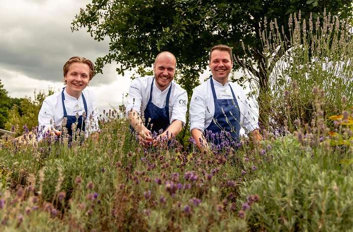 The chefs at Landhuishotel & Restaurant De Bloemenbeek photographed in the garden.