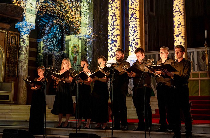 A choir performing for Luminiscence at Westminster Cathedral.