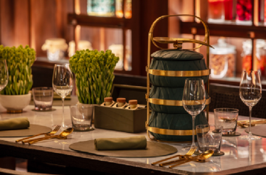 The dining table is set with traditional Thai presentation at the Spice Market restaurant.