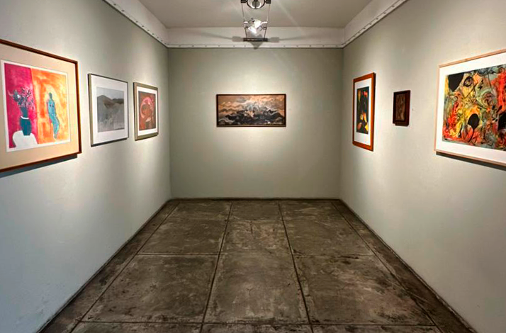 Paintings on display at Galería Oscar Román.