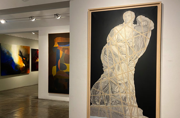 Large paintings on display at at Galería Oscar Román.