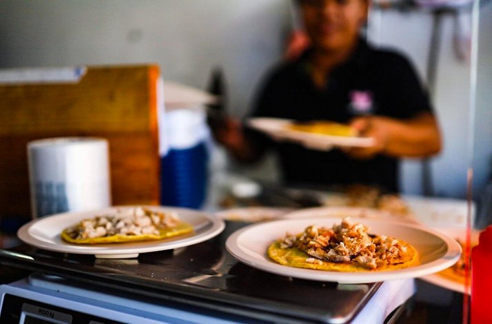 Freshly prepared Mexican tostadas served at a local food stall in Playa del Carmen during the Hidden Flavors of the Caribbean food tour.