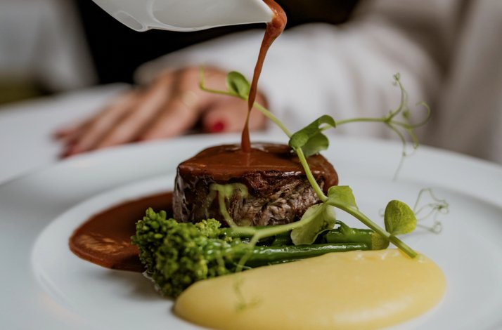 Portuguese fine-dining dish served with wine-paired tasting menu at Adega Machado.