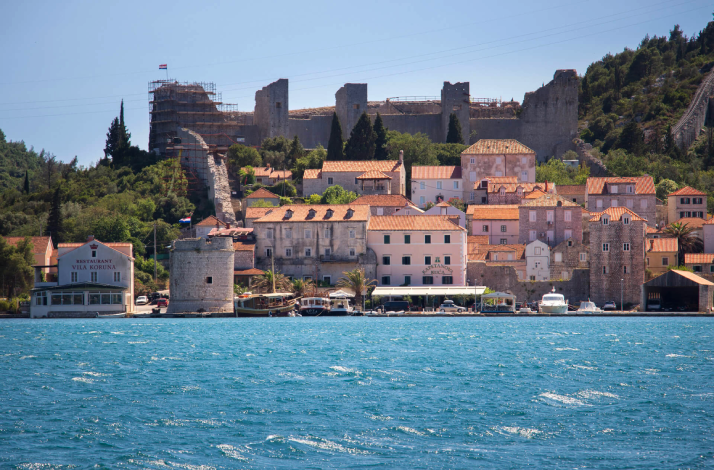Medieval Ston Walls and fortifications on the green hills of Mali Ston, Pelješac peninsula, Croatia.