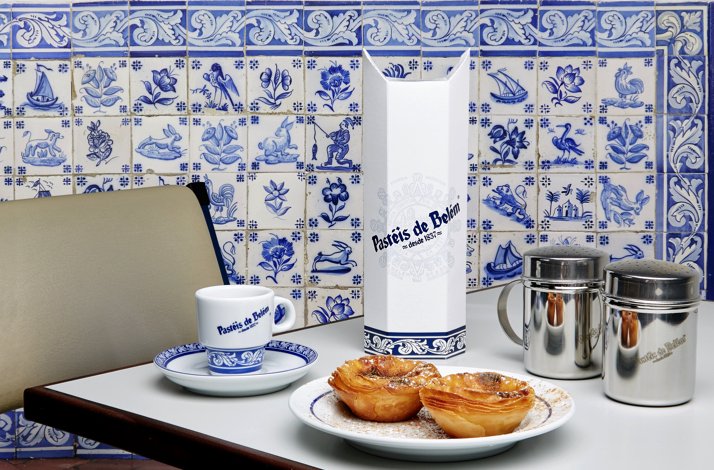 Dining table and pastries set for customer to dine at Pastéis de Belém.