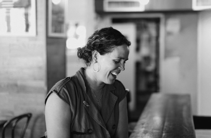 Co-owner of The Edge Harlem, Justine seen smiling.