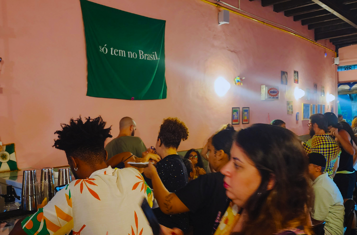 People enjoying life at one of Rio de Janeiro's bar.