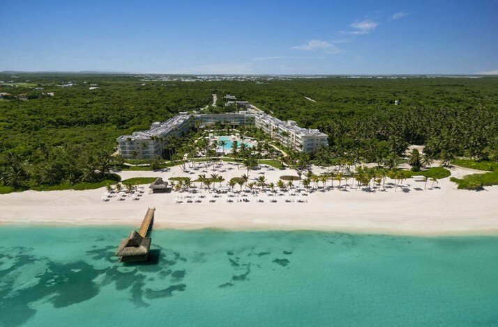 Aerial view of Westin Puntacana Resort beachfront and pier.