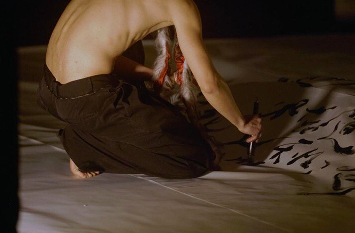 Artist Jiannyuh Wang performing Calligraphy Dance at The Feuerle Collection museum in Berlin, Germany.