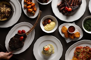 A spread of dishes from The Vermilion Club in Boston, MA.